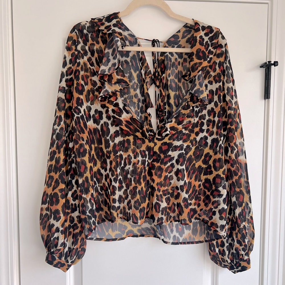 Orange, black and red leopard print top by TopShop. US size 10.